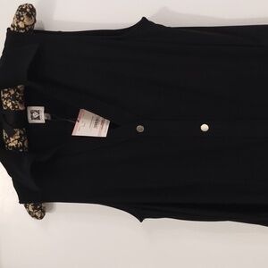 Black midi dress with slits on sides and sash.